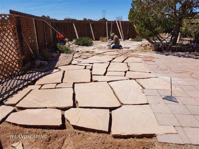 Flagstone patio installation