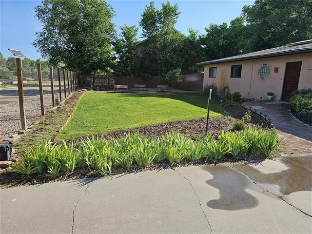 Well kept lawn and garden beds